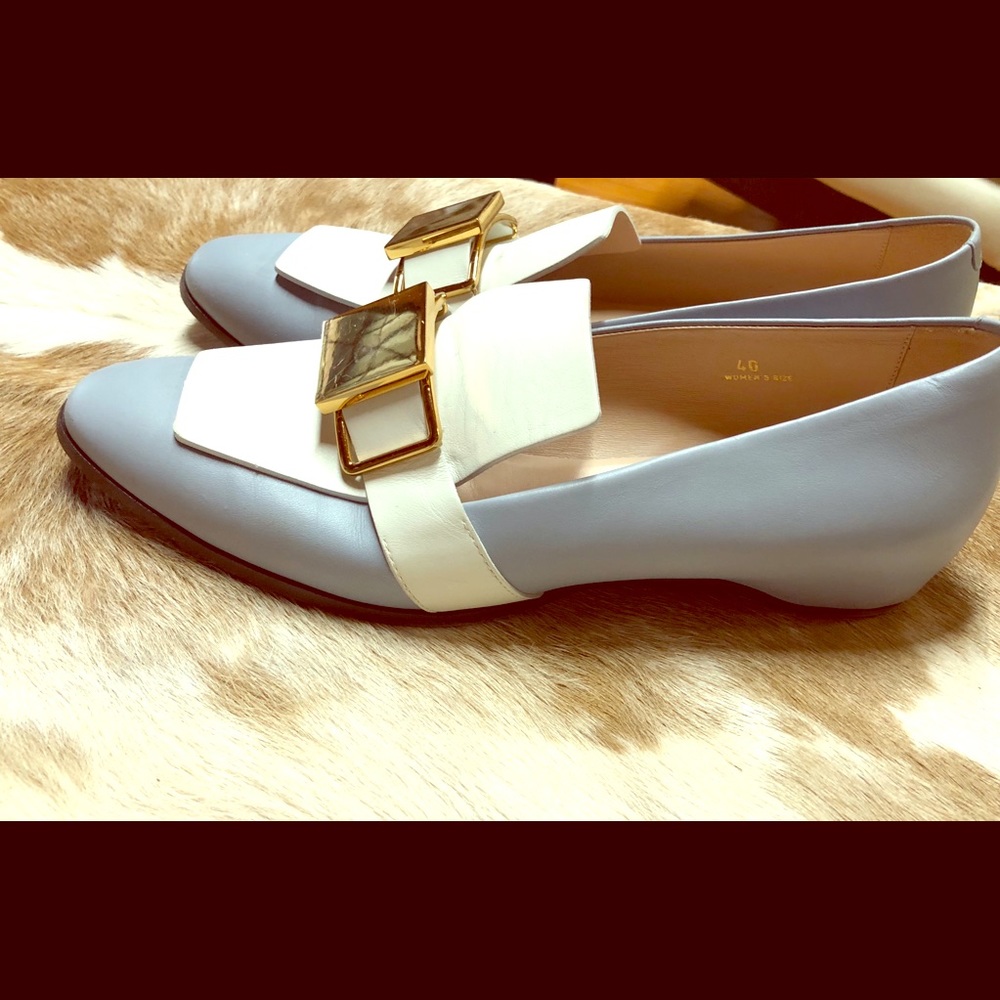 Tods       butter soft leather  AMAZING!     .  10